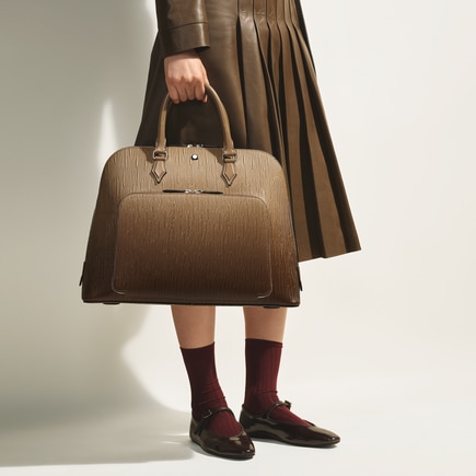 The writing traveler handbag